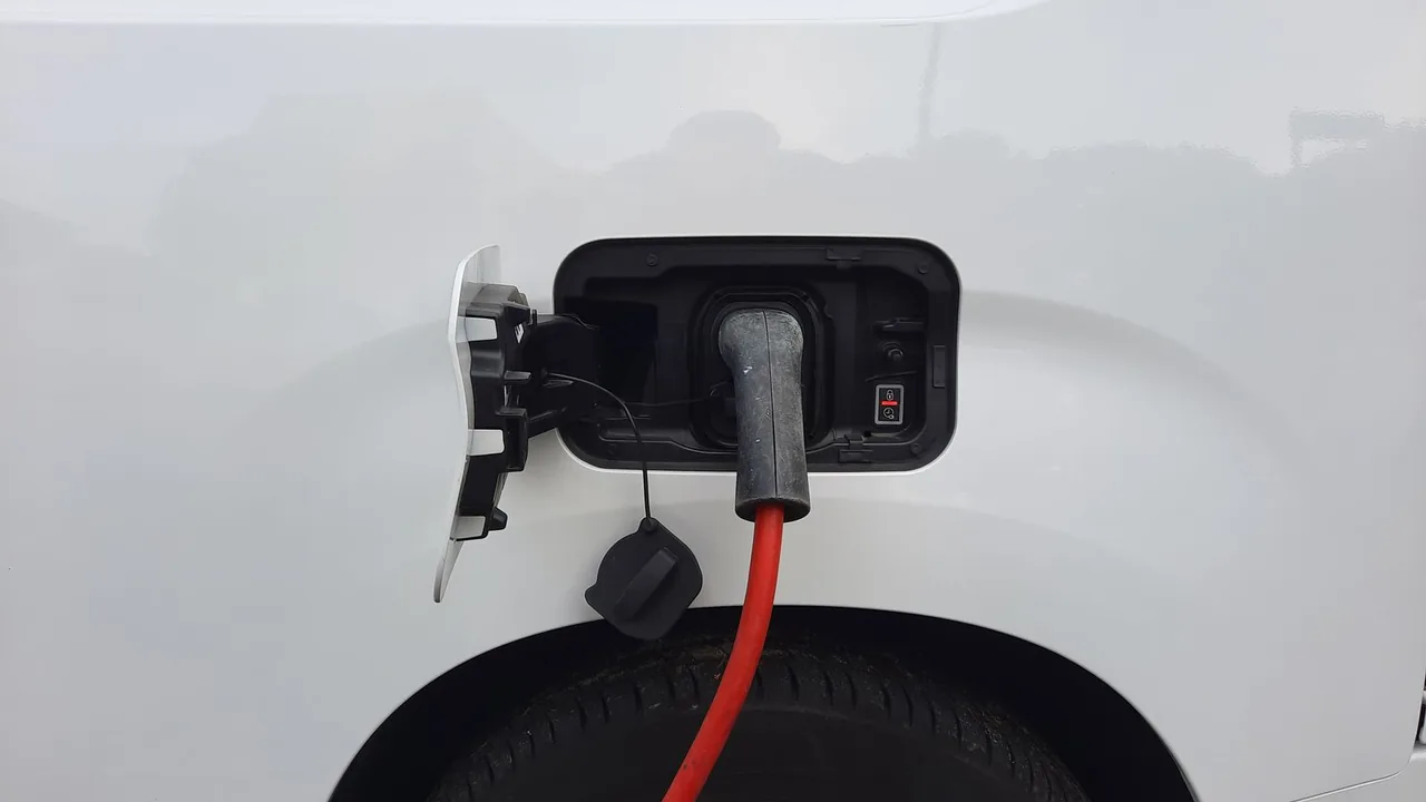 Charging cable plugged into the charge port of an electric vehicle